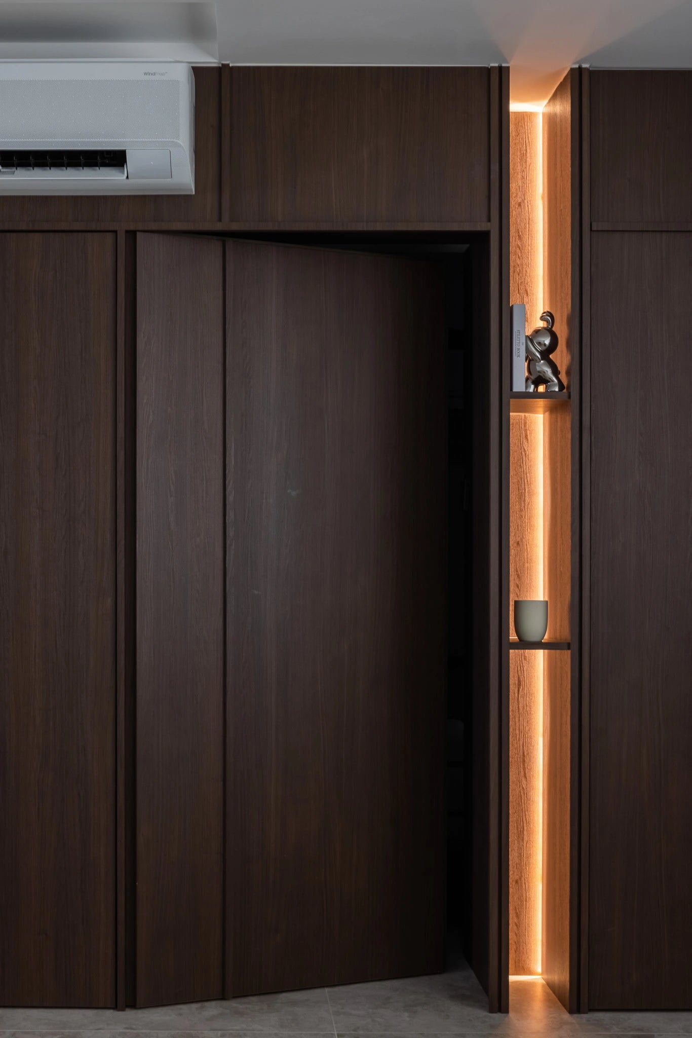 Mid-century modern home with full-height cabinetry and display shelves