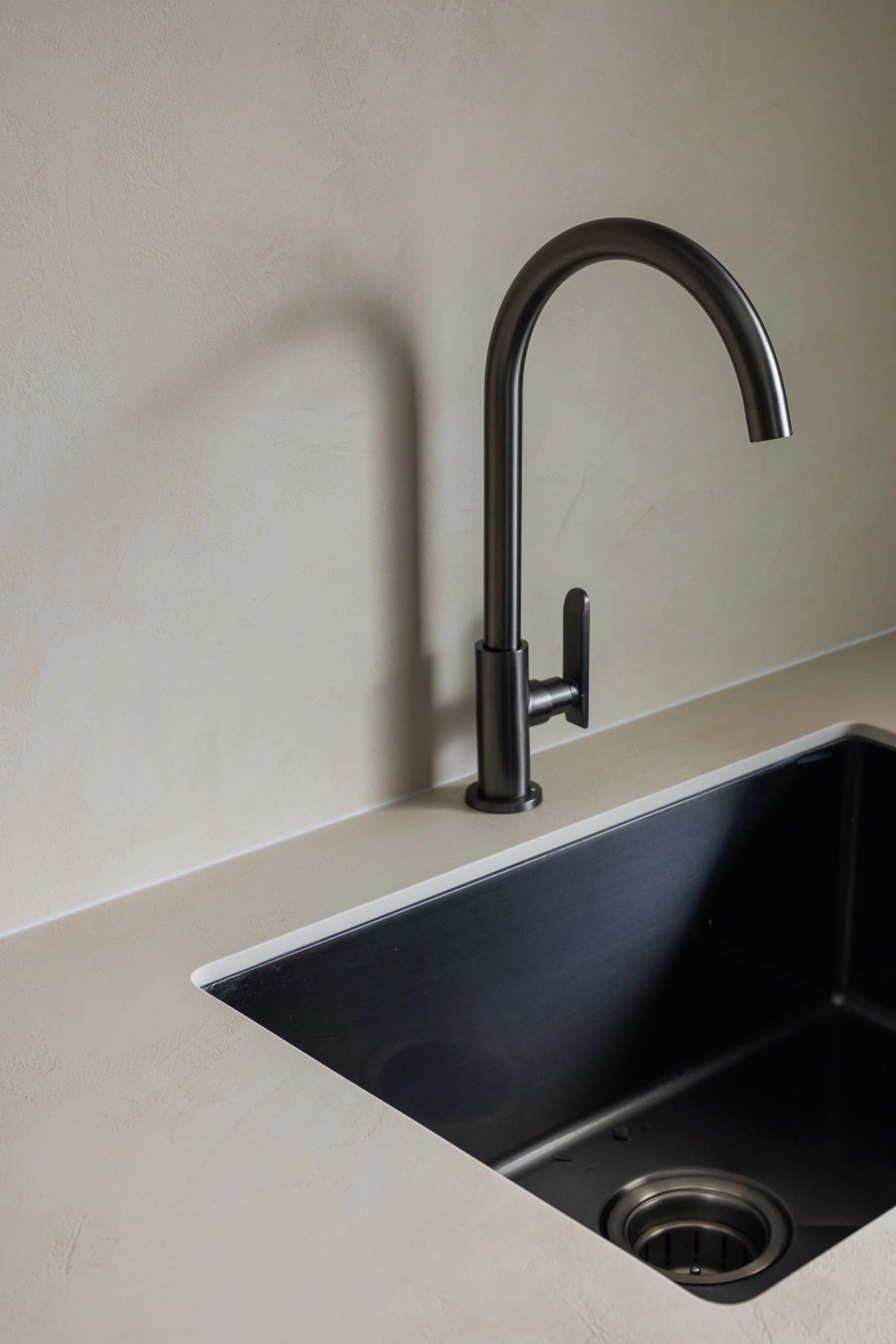Mid-century modern kitchen with gunmetal faucet