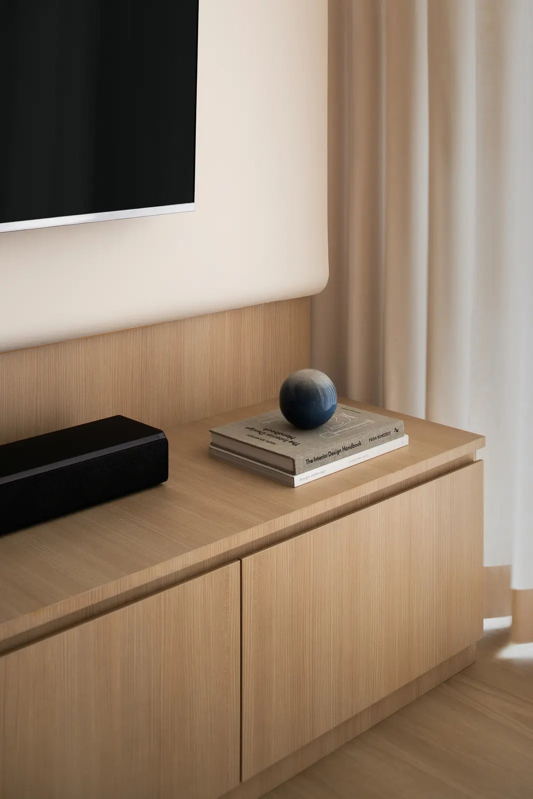 Scandinavian living room with wooden TV console